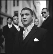 Kyle Egan, a student from Fordham University College of Business Administration, with fellow students on Wall Street outside the New York Stock Exchange